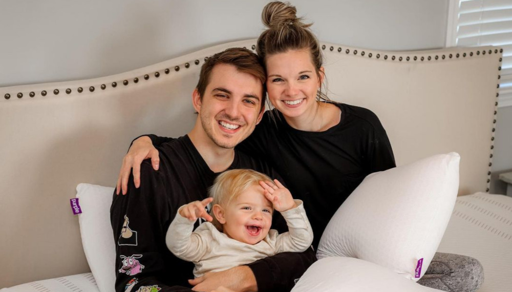 Chris Tyson and Katie with their son
