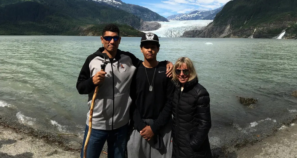 Jay Norvell's wife and his son Jaden